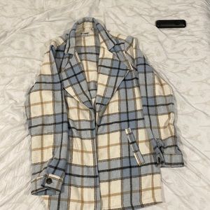 Blue/tan/white cotton flannel with pockets.